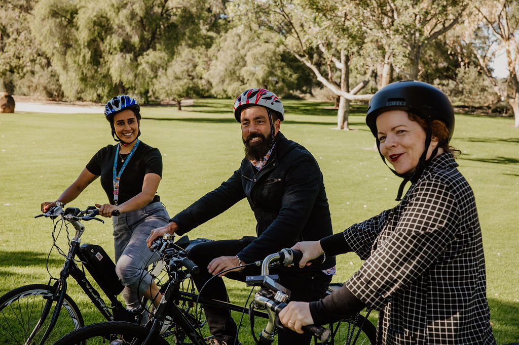 3 Staff testing out our new E Bikes