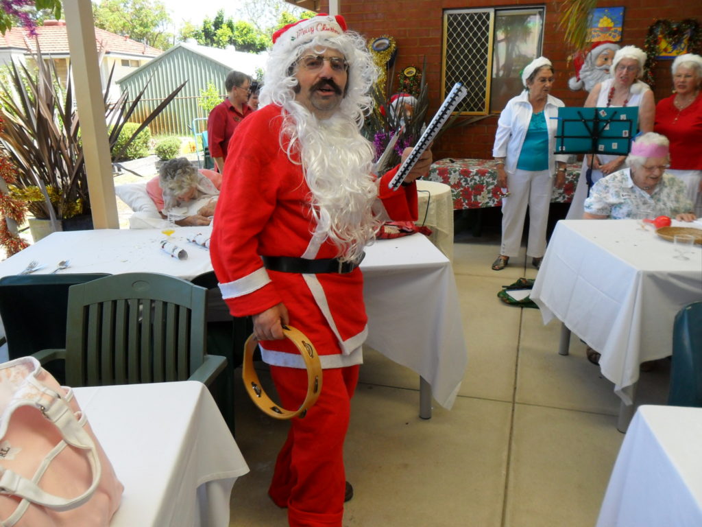 Davis house support worker nat dressed as Santa