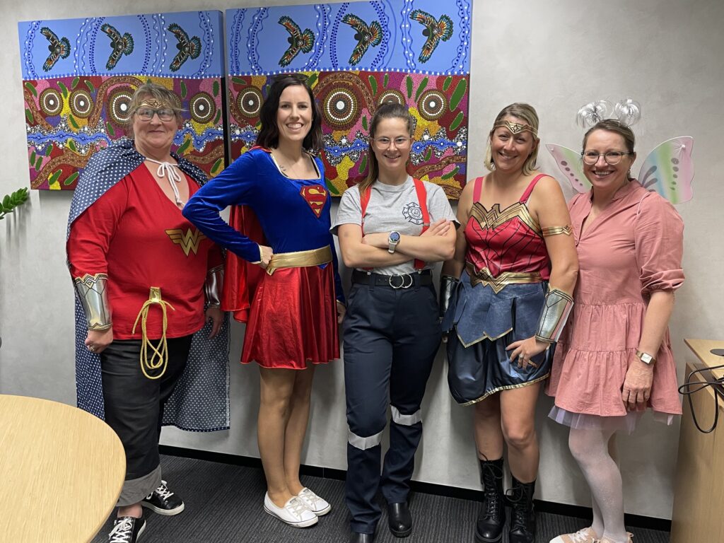 Early Learning Volunteers posing in costumers